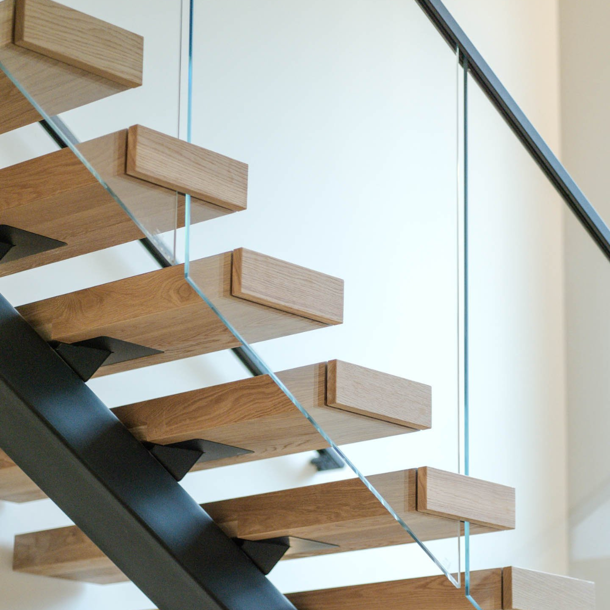 Floating stair with tempered glass railing
