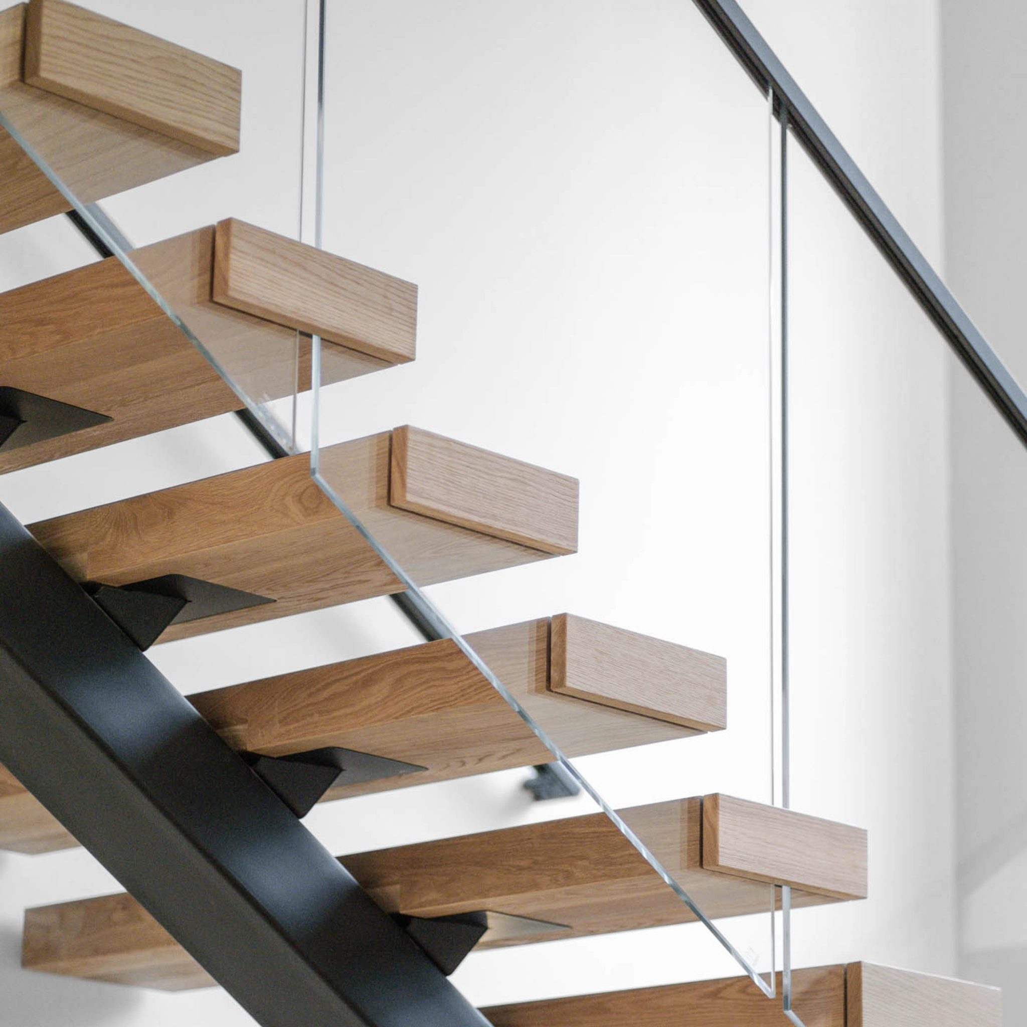 Vedera Glass Railing on a FLIGHT Mono staircase.
